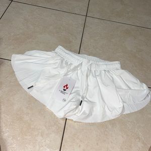 This is a dark blue flowy skirt. The brand is Liberty Pro.